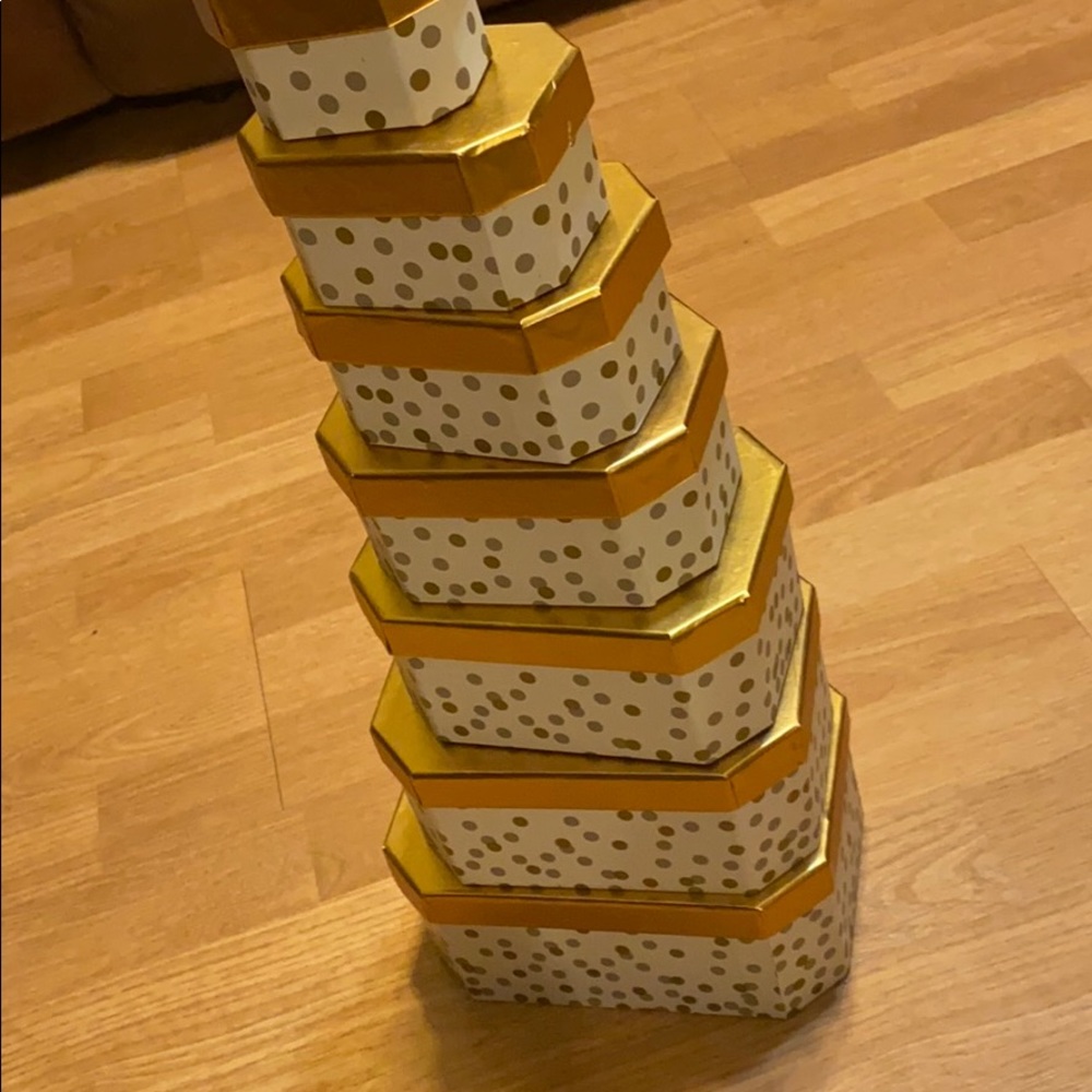 7 stacking gift boxes gold and white polka dot